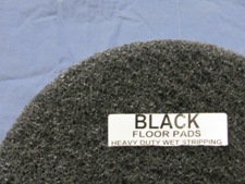 top half of black floor pad, label displayed
